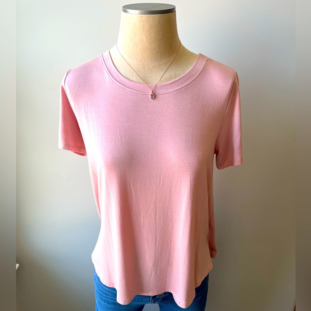Bamboo tees are super soft and versatile. Color is Light Pink and various sizes